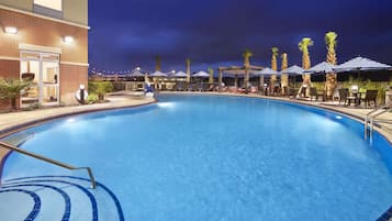 Outdoor pool, open 10:00 AM to 10:00 PM, sun loungers