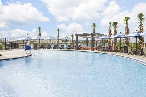 Outdoor pool, open 10:00 AM to 10:00 PM, sun loungers