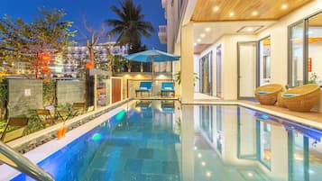 Outdoor pool, pool umbrellas, pool loungers