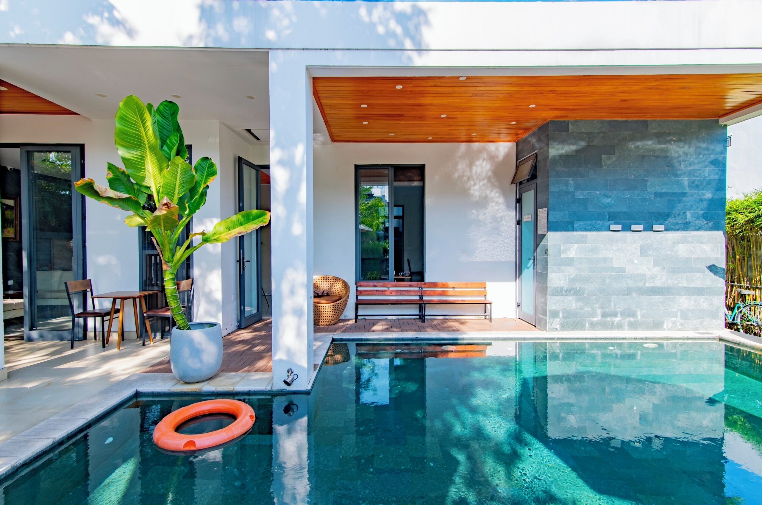 outdoor pool, pool umbrellas, pool loungers