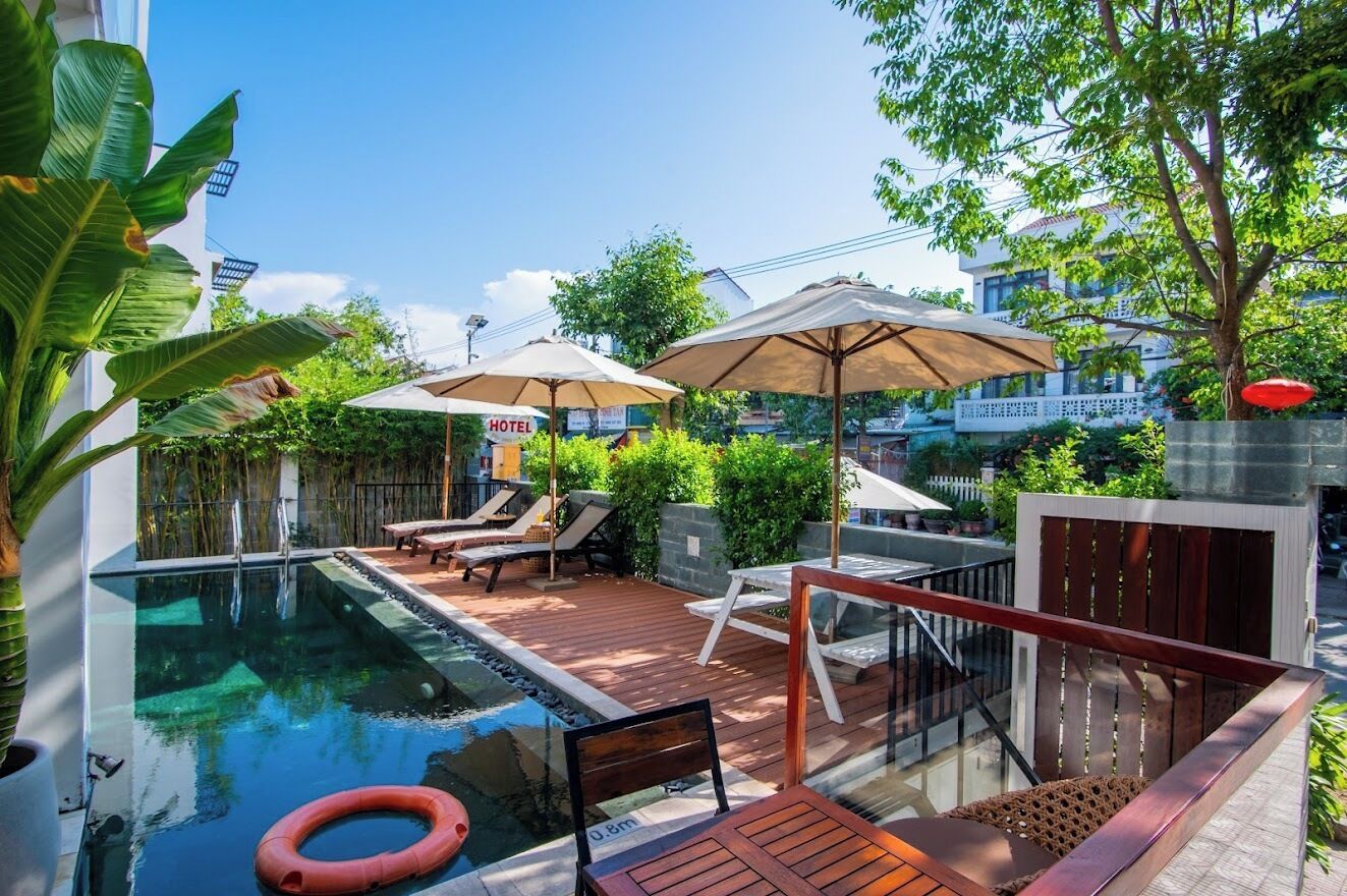 outdoor pool, pool umbrellas, pool loungers