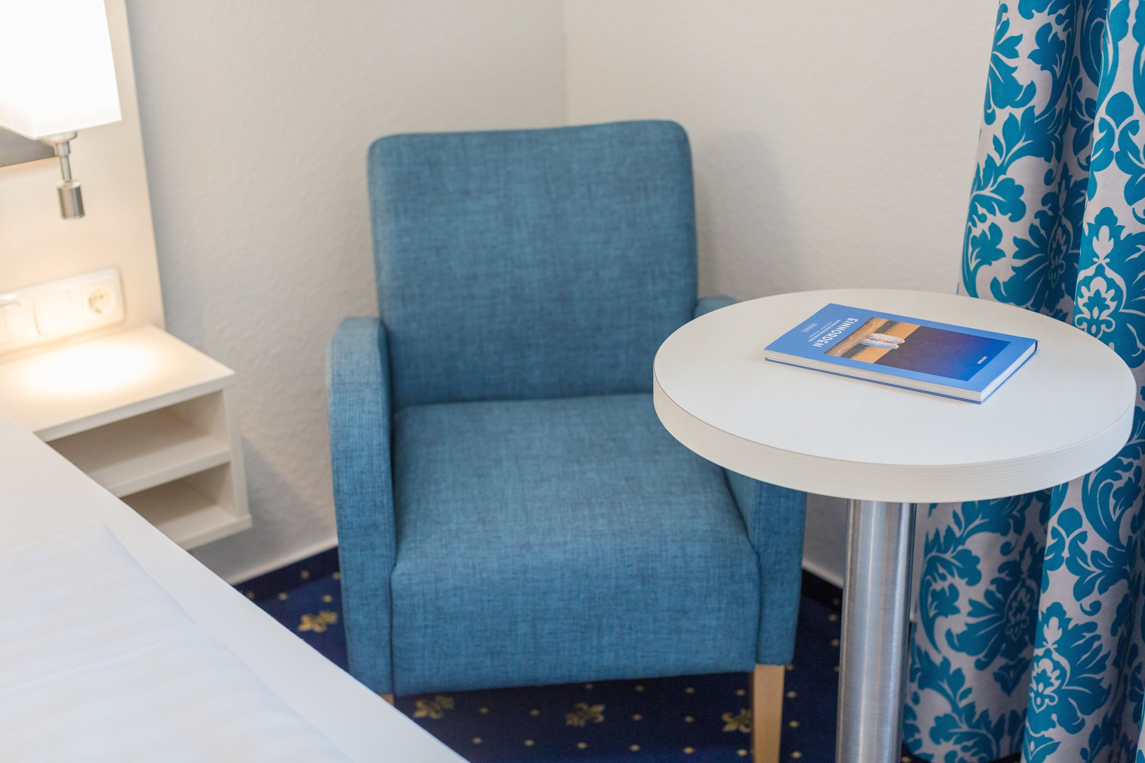 premium double room | living area | flat-screen tv