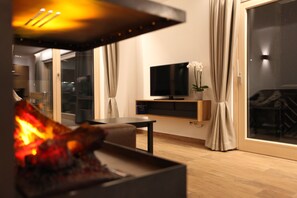 Premium Apartment, 2 Bedrooms | Living room | 48-inch plasma TV with satellite channels, TV, DVD player - Engadin Lodge (Samnaun)