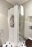 Premier Studio, 1 Bedroom, Non Smoking, Kitchenette (Glicinias) | Bathroom | Shower, hair dryer, bathrobes, slippers