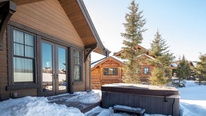 A wooden cabin with a hot tub and a covered porch. - Managed by Park City Lodging-Private Home with Stunning Deer Valley Resort Views (Park City)