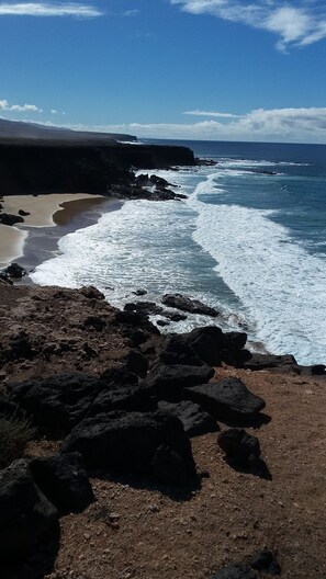 Espreguiçadeiras, toalhas de praia 