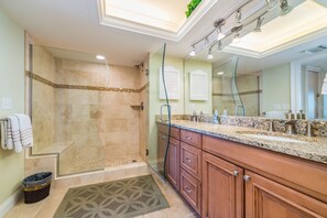 Combined shower/tub, hair dryer, towels, soap