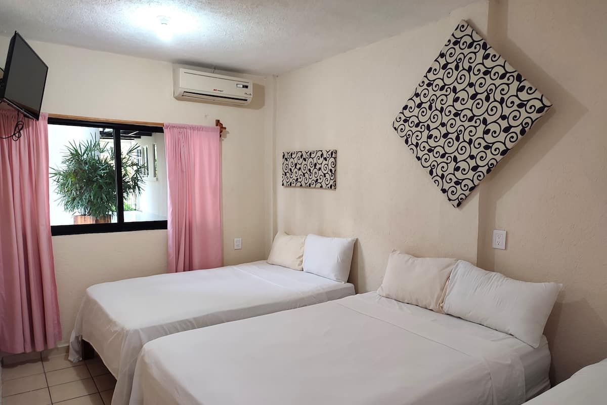 Standard Triple Room | 2 bedrooms, bed sheets