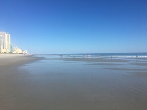 On the beach, sun-loungers