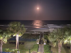 On the beach, sun-loungers