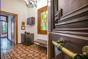 You enter a large foyer