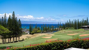 A golf course with a view of the ocean and mountains in the background. - The Most Gorgeous OV Villa in Kapalua Sleeps 6 (Kapalua)