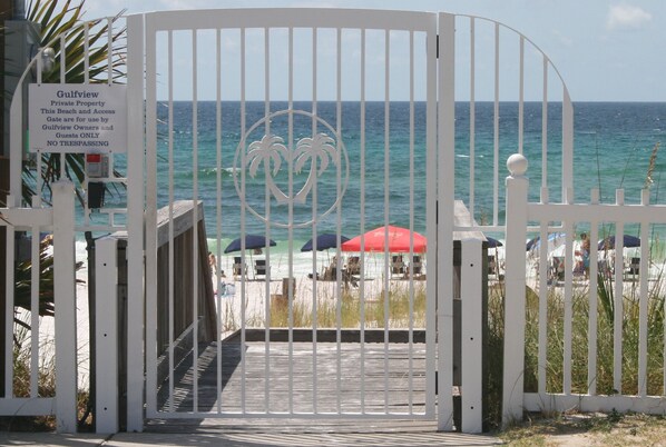 On the beach, sun-loungers