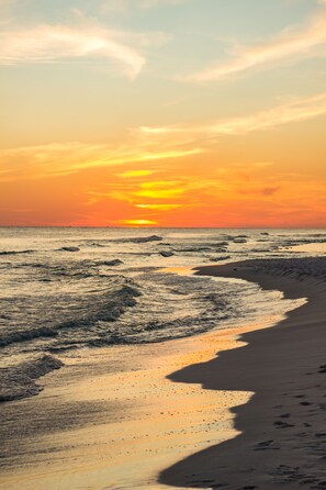 On the beach, sun-loungers