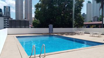 Outdoor pool, pool umbrellas, pool loungers