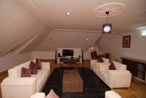 Presidential Suite, 1 Double Bed | Lounge - The Grosvenor Suite (Abuja)