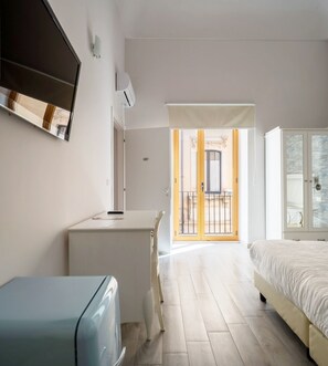 Standaard vierpersoonskamer | Een kluis op de kamer, gratis wifi, beddengoed