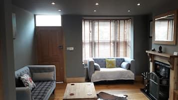 Premium Cottage, Multiple Beds, Non Smoking | Living area | Flat-screen TV