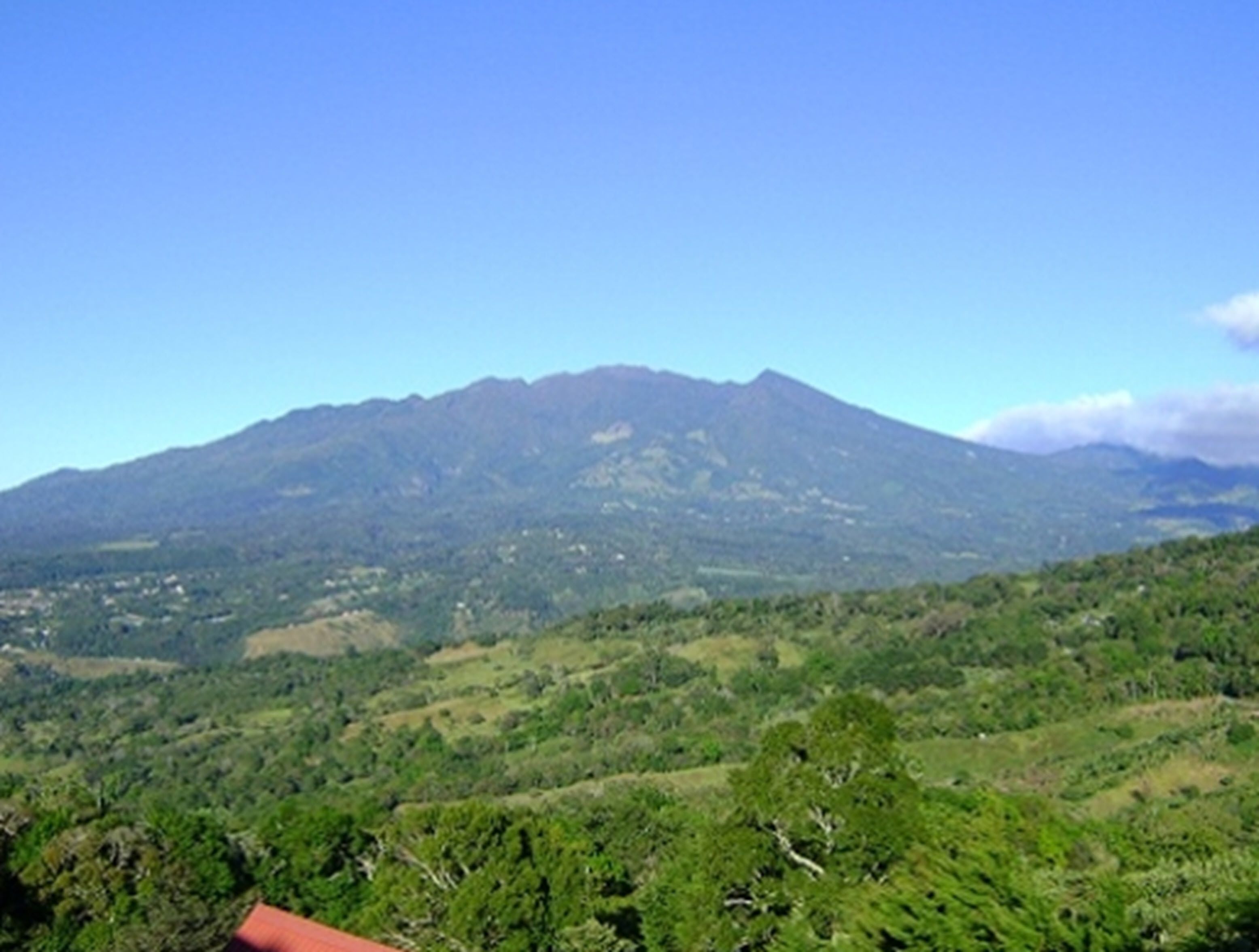 A mountain landscape with a clear sky.