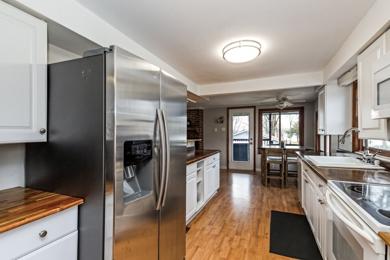 Fridge, microwave, coffee/tea maker, cookware/dishes/utensils