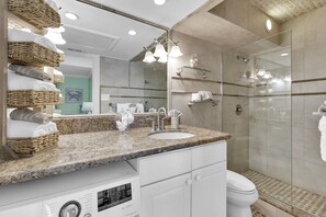 Shower, hair dryer, towels