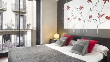 2 dormitorios, caja fuerte, tabla de planchar con plancha