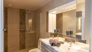 Combined shower/tub, hair dryer, towels, soap