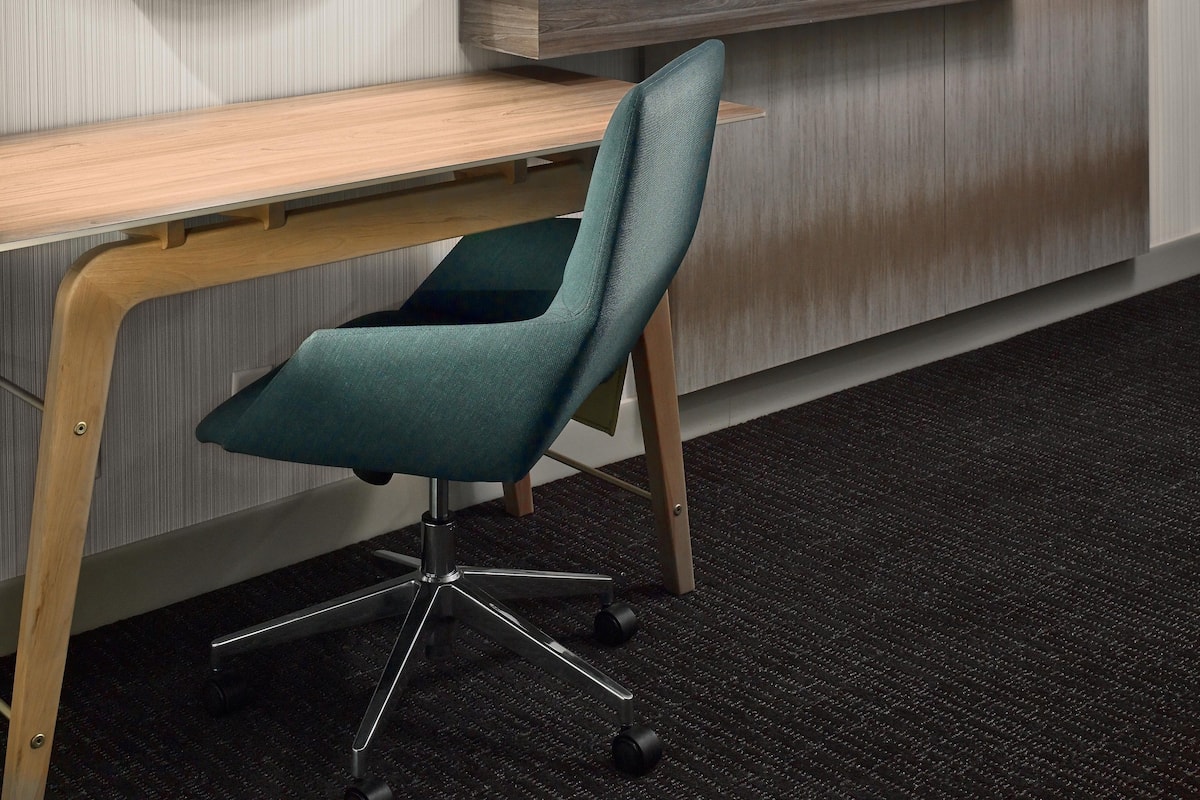 Camas con pillow-top, escritorio y espacio para trabajar con laptop