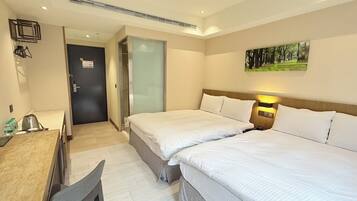 A hotel room with two beds, a desk, a chair, a painting on the wall, and a door leading to another room.