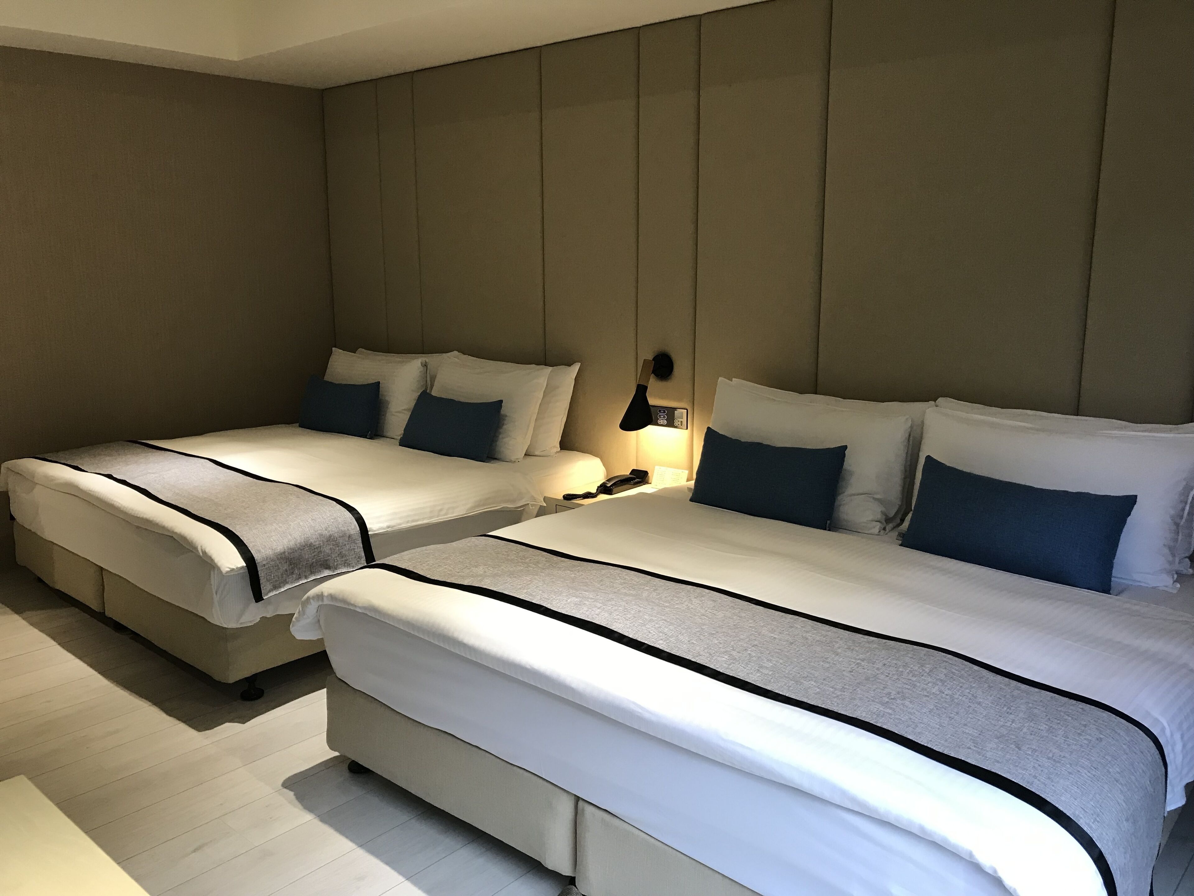 deluxe quadruple room | in-room safe, desk, free wifi, bed sheets