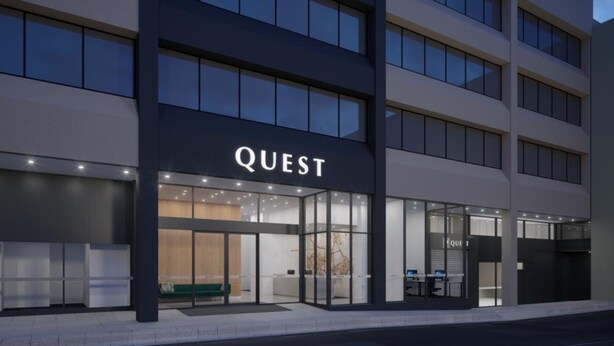 A modern building with a large sign reading "QUEST" above the entrance. - Quest Canberra City Walk (Canberra)