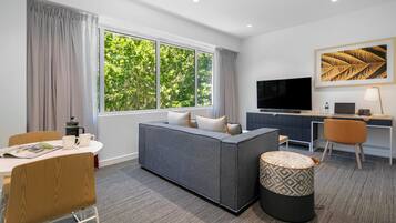 55-inch Smart TV with cable channels, TV, iPod dock