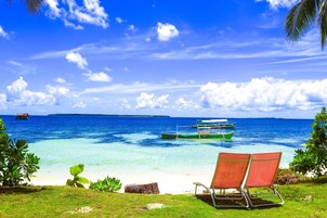 Playa privada, arena blanca