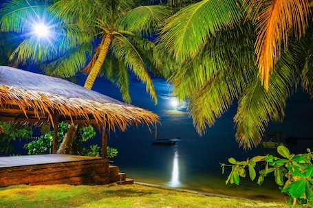 Front of property - evening/night. Retreat Siargao Resort
