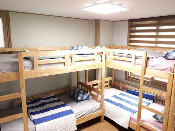 Down duvets, memory-foam beds, desk, laptop workspace