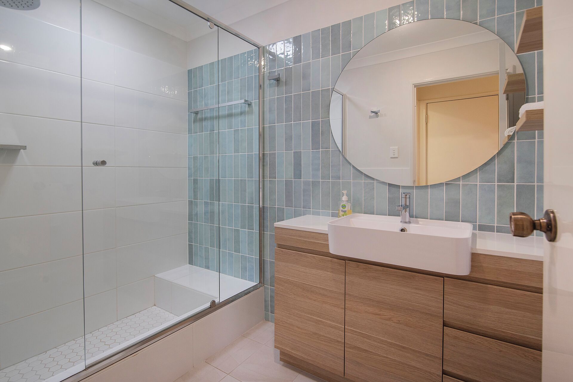 Combined shower/bathtub, hair dryer, towels, soap