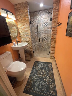 A bathroom with a toilet, sink, and shower. - River/Mountain Getaway-Private, Large,In-Law Suite (Jamestown)