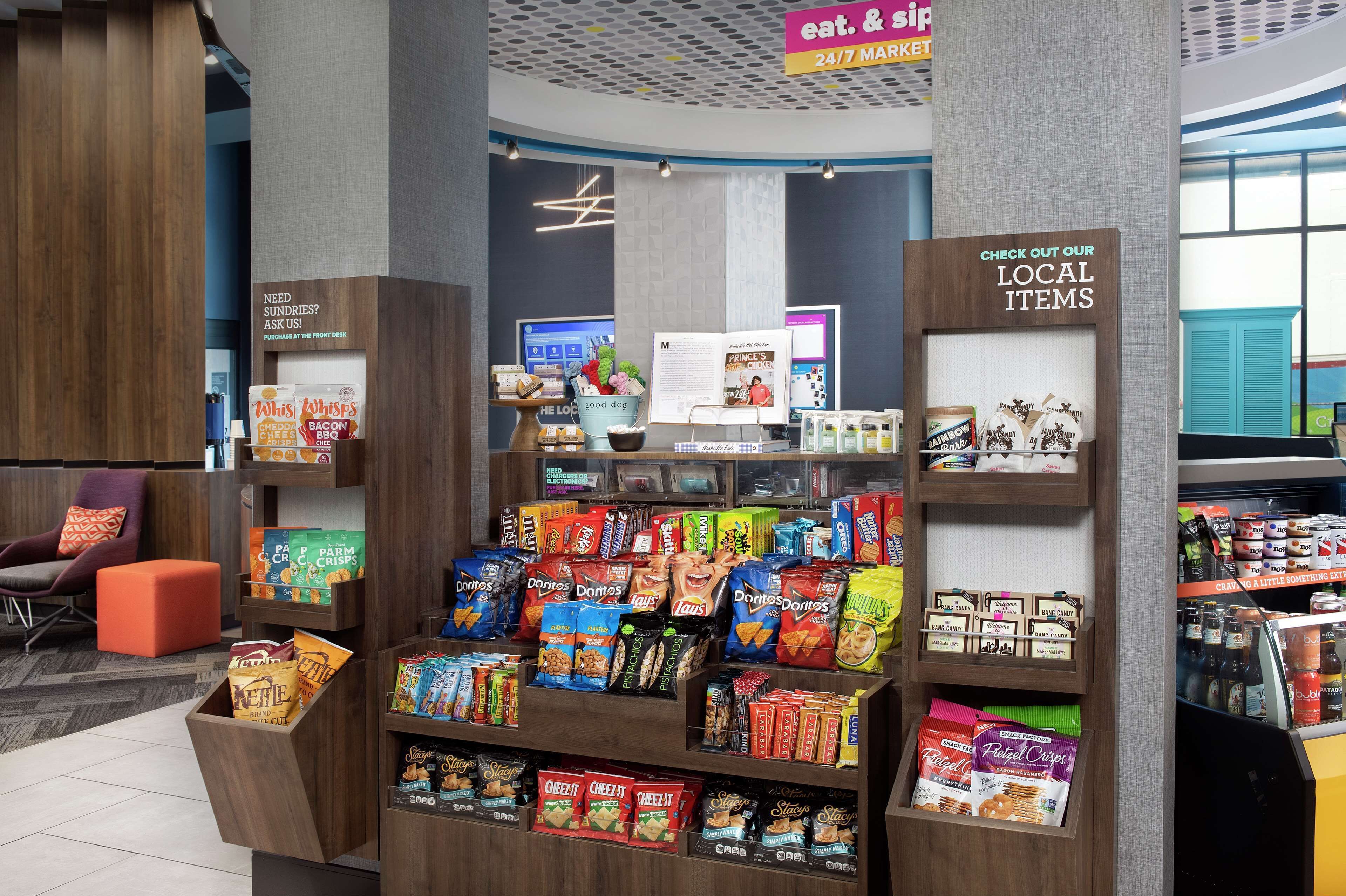 A snack display with various chips and snacks.