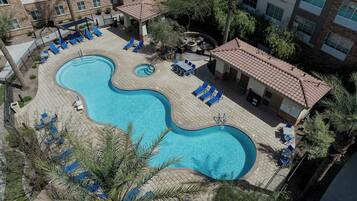 Outdoor pool, open 7 AM to 10 PM, free cabanas, pool umbrellas