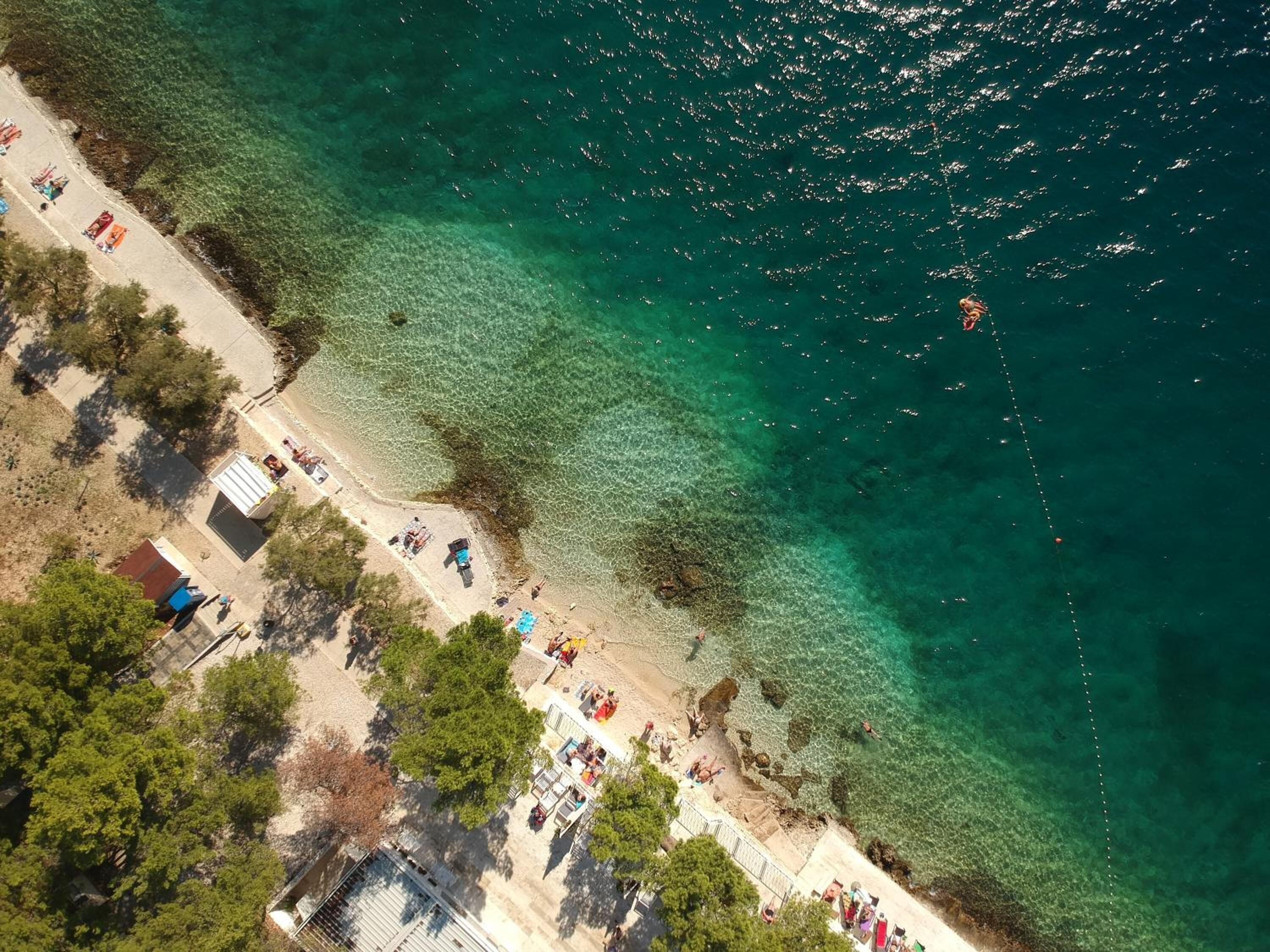On the beach, sun-loungers, beach umbrellas