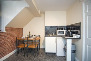 Full-size fridge, microwave, electric kettle, toaster
