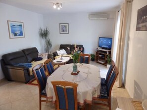 Comfort Apartment, 2 Bedrooms | Living area | Flat-screen TV, fireplace - Apartments Biocic (Korcula)