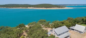 400 feet of private lake front, home and cottage on 3.4 acres, sleeps 16!