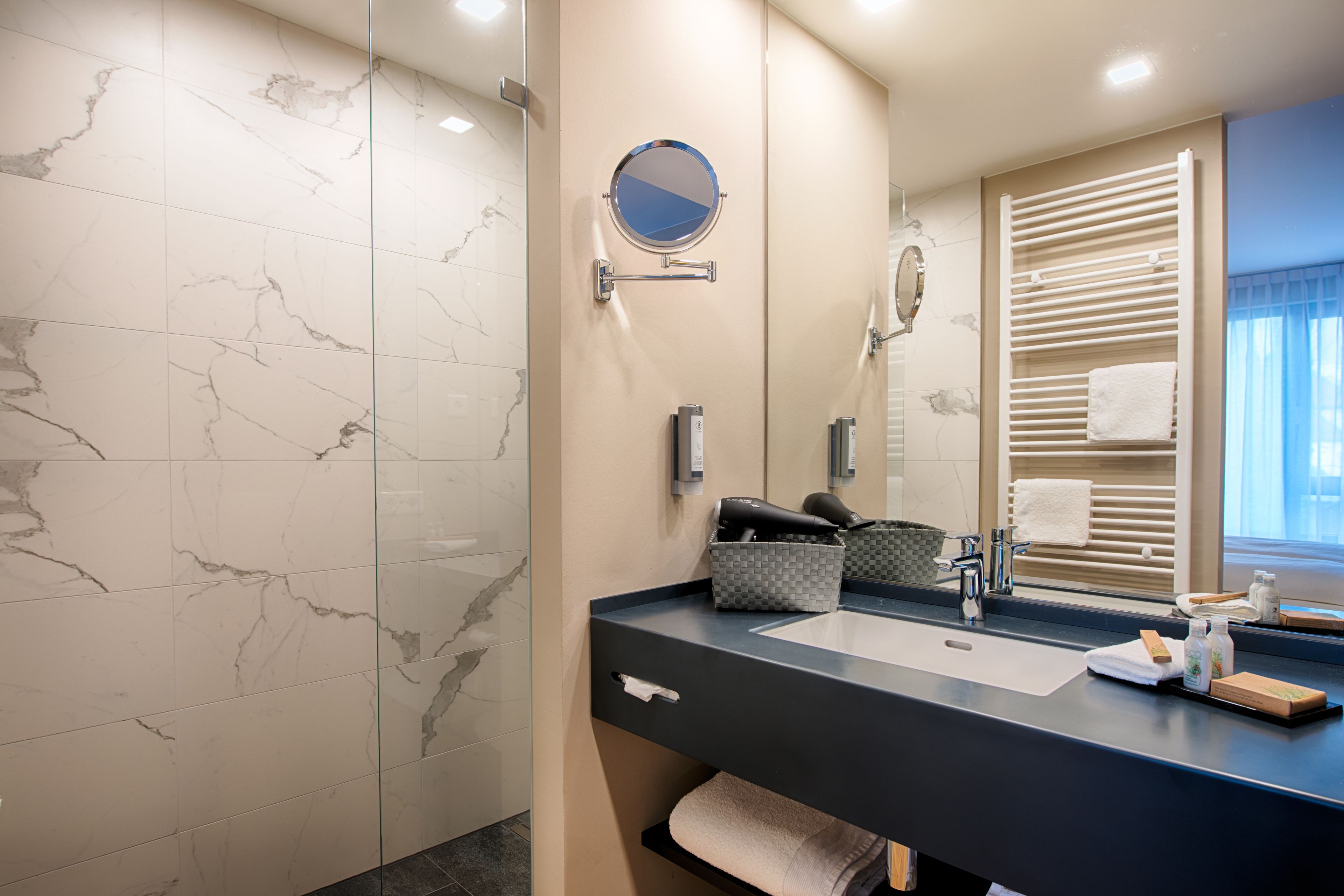 shower, eco-friendly toiletries, hair dryer, towels