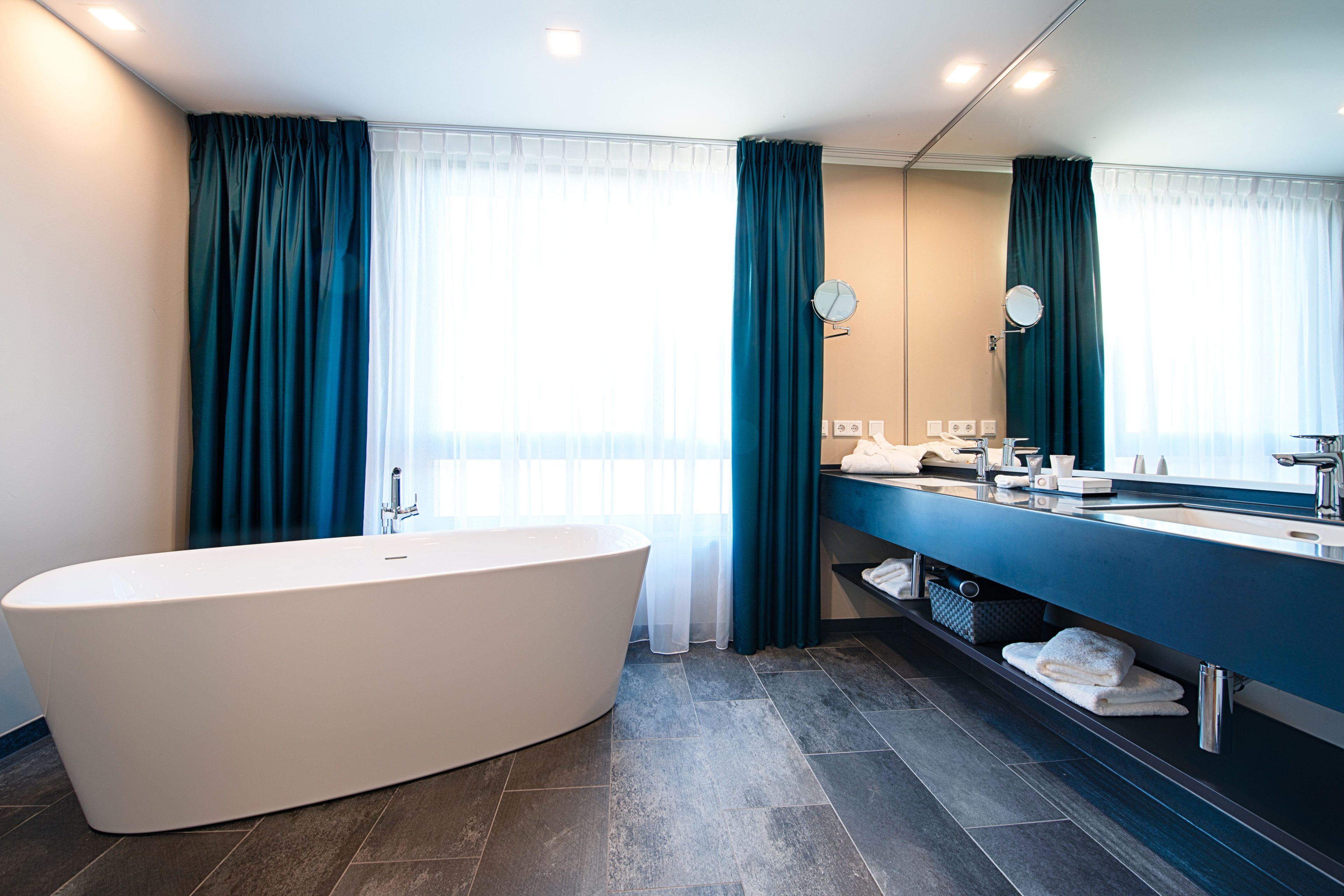 shower, eco-friendly toiletries, hair dryer, towels