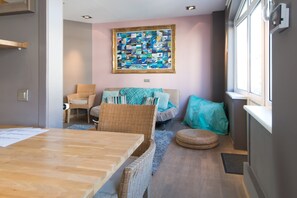 Appartamento Comfort | Area soggiorno | TV a schermo piatto