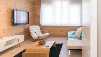 Comfort Apartment | Living room | Flat-screen TV
