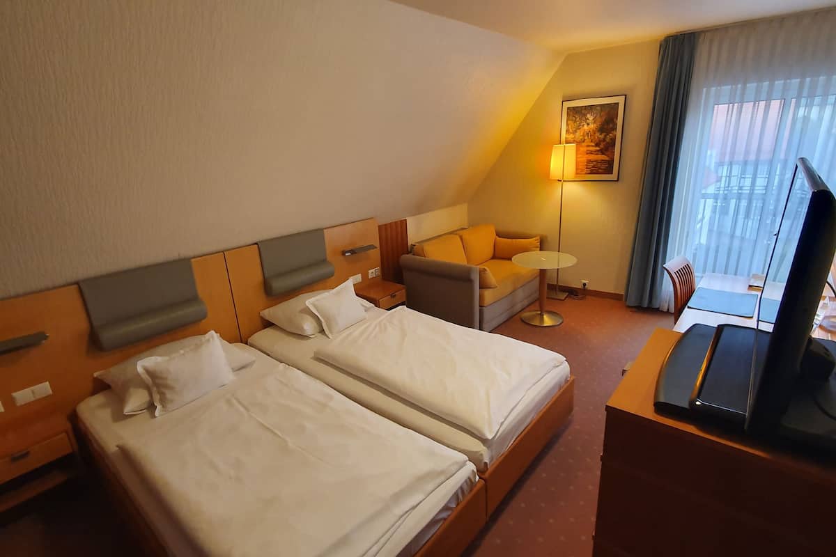 Desk, laptop workspace, blackout curtains, free WiFi