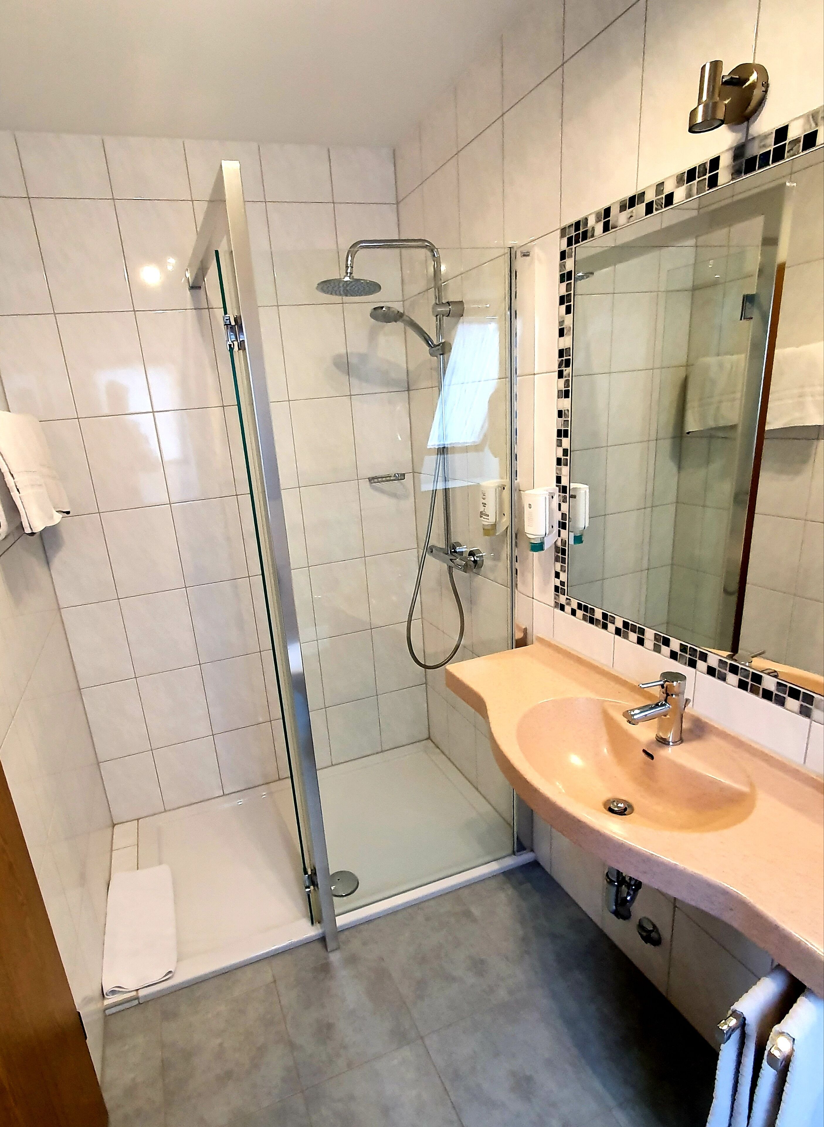 comfort double room | bathroom | shower, hair dryer, towels, soap