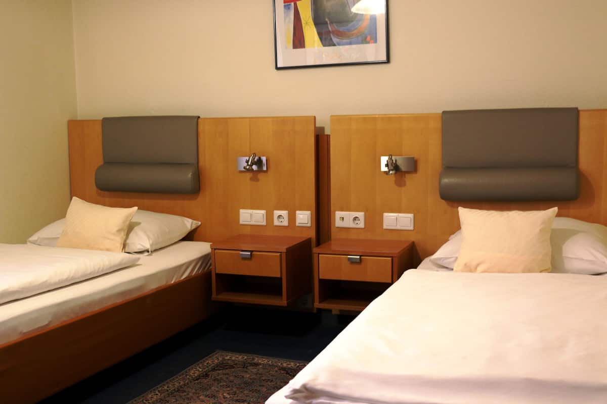 Desk, laptop workspace, blackout curtains, free WiFi